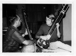 Ned Dominick learning Sitar from Mr. Rama