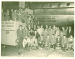 College of the Pacific football team next to Pan American airliner by Unknown