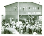 Man at microphone during event at Colberg Boat Works, Stockton by Unknown