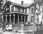 Dwellings - Stockton: [Home of Andrew Simpson, children in front, El Dorado St. and Oak St.] by Unknown
