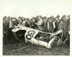 Automobile Racing - Stockton: crowd surrounding crashed racecar, [Nita Vitagliano] by Van Covert Martin