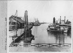 Steamboats-Stockton-"T.C. Walker" and "Robert's Island" docked in harbor by Van Covert Martin