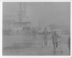 Steamboats-Stockton-workers loading or unloading unidentified steamboat by Van Covert Martin