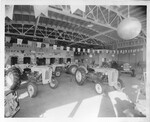 Tractors-Stockton-Tractors on display in showroom of R.L. Berve Tractor Co. by Van Covert Martin