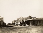 Stockton - Streets - 1850s - 1870s: El Dorado St. looking south from Weber Ave., Steinhart's IXL, C.V. Thompson Produce, C. Behrns Crockery and Glass by Unknown