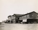 Stockton - Streets - 1850s - 1870s: California St. looking north at Market St.; Abbott, Williams, and Stowell Relief Windmill Works; Sylvester and Moye Furniture by Unknown