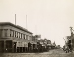 Stockton - Streets - 1850s - 1870s: El Dorado St. at Weber Ave., Independent Restaurant, Hall of the Pioneers, J. Waldman Cigars, Steinhart's IXL by Unknown