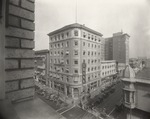 Stockton - Streets - c.1920 - 1929: Main St. and San Joaquin St., Stockton Savings and Loan Bank by Unknown