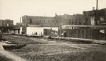 Stockton - Streets - 1850s - 1870s: Market St. and San Joaquin St. with jail in center background by Unknown