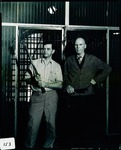 Stockton - Jails: Jailers, Bob Patton and another standing in front of closed cells with billy clubs in hand by Unknown