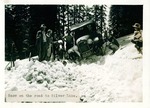Stockton - Muncipal Camp: Family with car stuck in the snow on the road to Silver Lake by Van Covert Martin