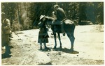 John Muir and "Miss" Garvey near top of Nevada Fall, Yosemite