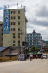 Building with billboard on it, in Liping by Marie Anna Lee