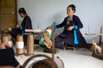 Woman spinning thread by Marie Anna Lee