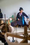 Woman spinning thread by Marie Anna Lee