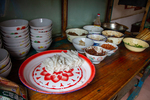 Food at market in Maogong by Marie Anna Lee