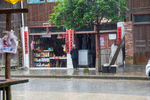 Storefront at market in Maogong by Marie Anna Lee
