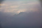 Fog obscuring mountain
