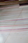 Threads on warping board by Marie Anna Lee