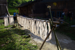 Cotton threads drying on poles