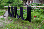 Dyed fabric hung up by Wu Meitz