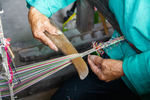 Weaving process; beating woven weft into the fell edge of the woven drawstring