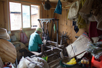 Wu Gaitian working on the frame loom weaving