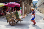 Street cleaner in Liping by Marie Anna Lee