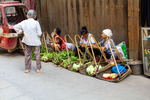 Selling vegetable in Liping by Marie Anna Lee