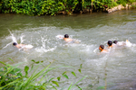 Kids swimming in river by Marie Anna Lee