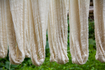 Hung cotton skeins by Marie Anna Lee