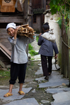 Wu Huazhuan carries firewood