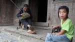 Basket weaver working by Marie Anna Lee