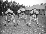 Football-Three University of the Pacific football players by unknown