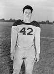 Football-University of the Pacific football player on field by unknown