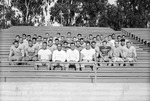 Football-University of the Pacific football team sitting on bleachers by unknown