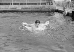 Swimming-Swimmer in pool by unknown