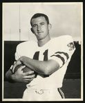 Football-University of the Pacific player with football by Record Photo