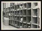 Football-Helmet storage in University of the Pacific locker room by unknown
