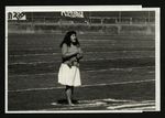 Football-Woman with micrphone on field at University of the Pacific game by unknown