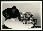 Football-Unidentified University of the Pacific player at table with food by unknown
