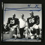 Football-Two unidentified University of the Pacific players and coach by unknown