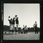 Football-Photographers on field with University of the Pacific players by unknown
