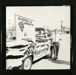 Football-Man next to University of the Pacific Chevrolet Corvair Tiger truck by unknown