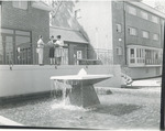 Raymond College Fountain, unidentified students by Unknown