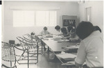 Raymond Students Studying in a Dorm, unidentified students by Unknown