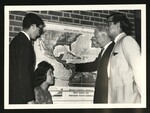 Elbert Covell Students with Map by Elbert Covell College