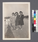 Groups of women #13 [beside "no parking" sign; 2nd view of women in #132]: (L-R) Florence Kubota, Helen Furuyama, Masa Yakahi