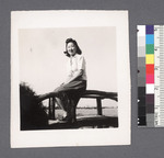 One woman #35 [seated on bridge; same person as #34] by Richard Shizuo Yoshikawa