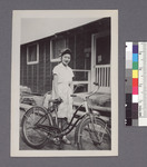 One woman #45 [in kerchief with bicycle]: Bonnie Masuda by Richard Shizuo Yoshikawa